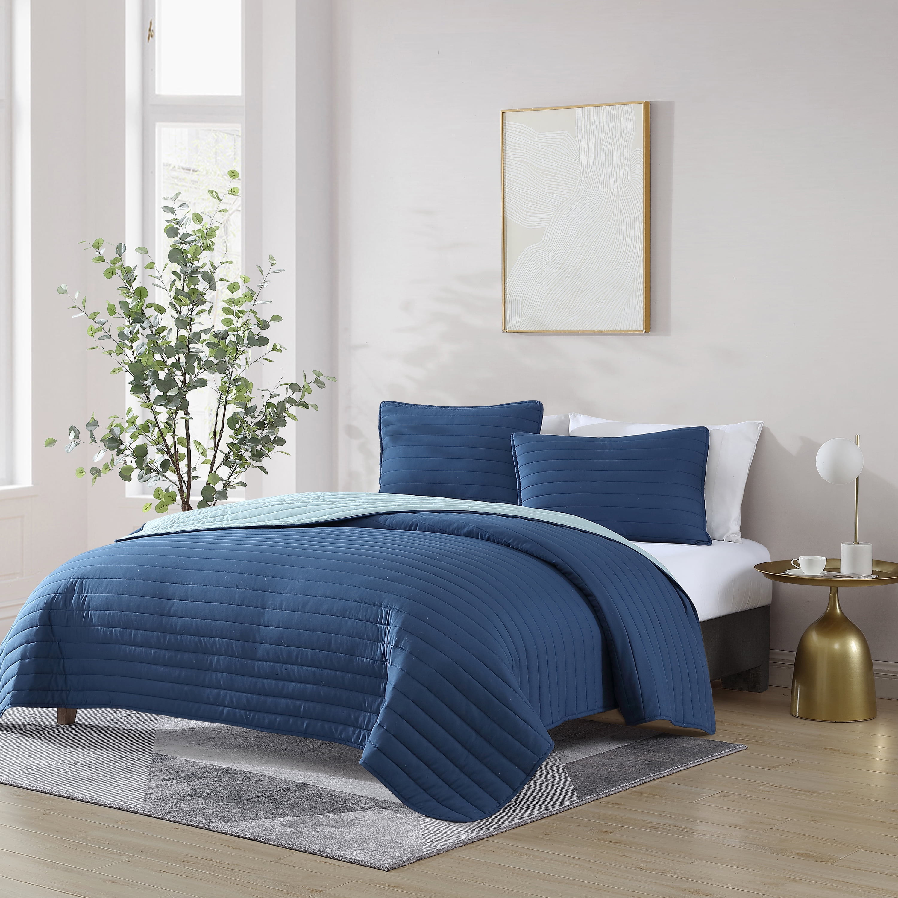 Blue Twin Reversible Microfiber Quilt Set with Pillow Sham