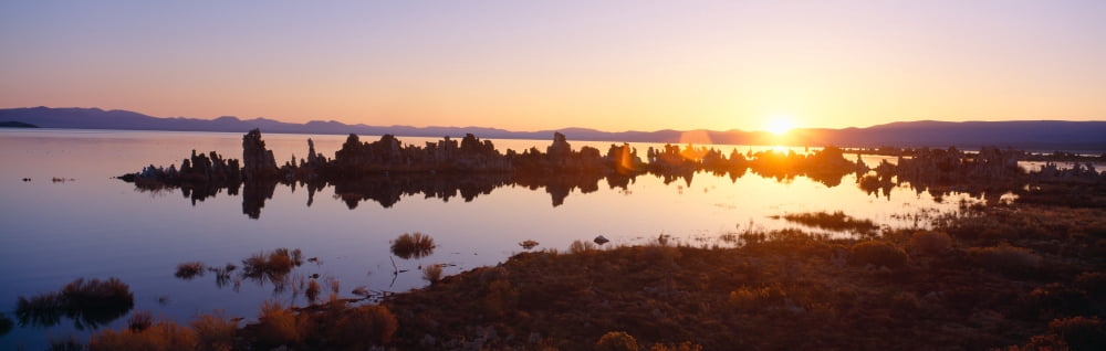 Tufa rock formations emerging from Mono Lake at sunrise California Canvas Art - Panoramic Images (27 x 9)