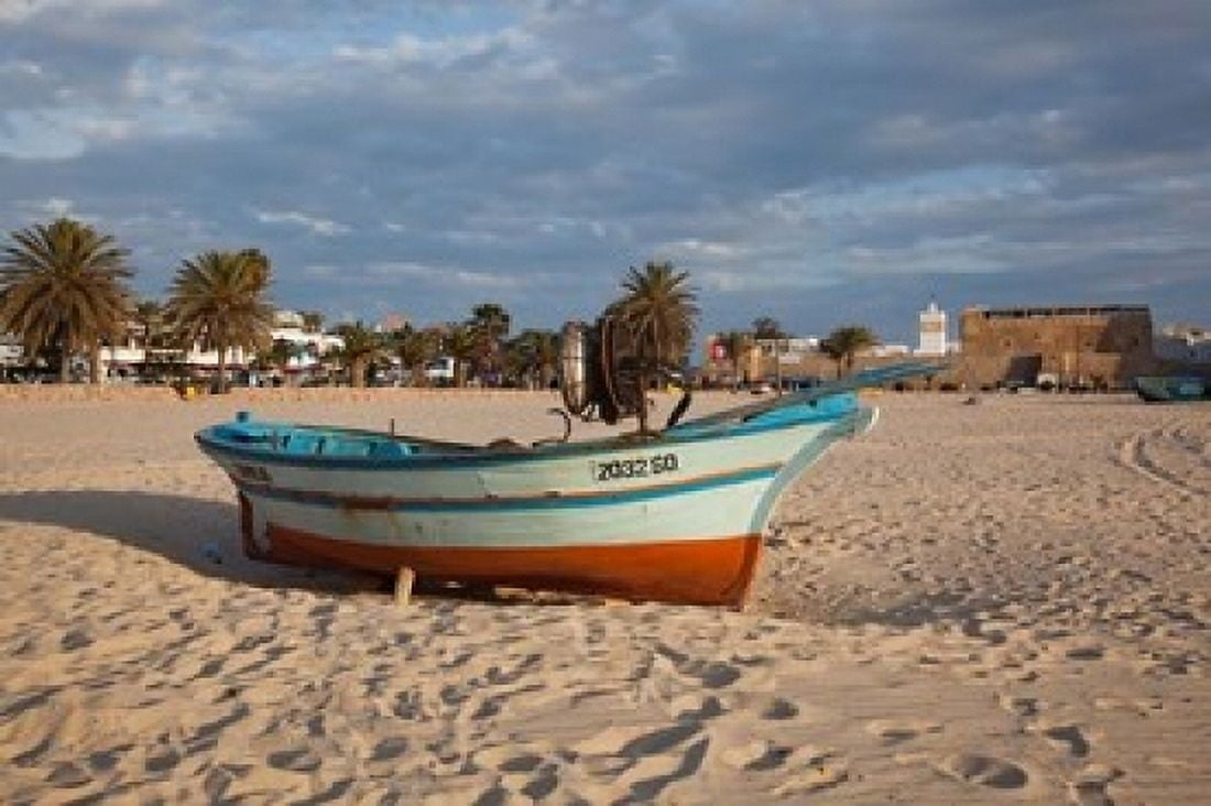 Tunisia Hammamet Kasbah Fort Fishing boats Canvas Art - Walter Bibikow DanitaDelimont (24 x 15)