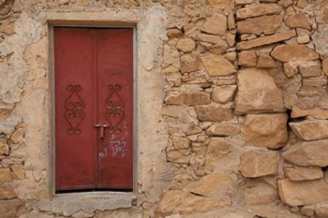 Tunisia Ksour Area Ezzahra village doorway Canvas Art - Walter Bibikow DanitaDelimont (24 x 15)