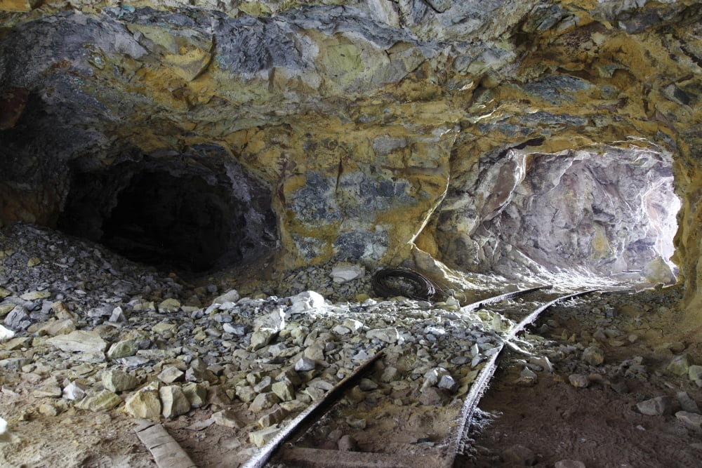 Tunnel with abandoned railtracks at historic sulfur mine Milos Greece Canvas Art - Richard RoscoeStocktrek Images (35 x 23)