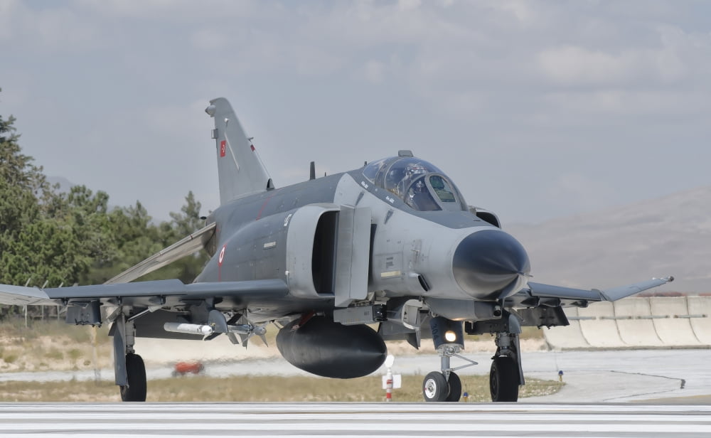 Turkish Air Force F-4 Phantom taxiing at Konya Air Base Turkey Canvas Art - Giovanni CollaStocktrek Images (36 x 22)