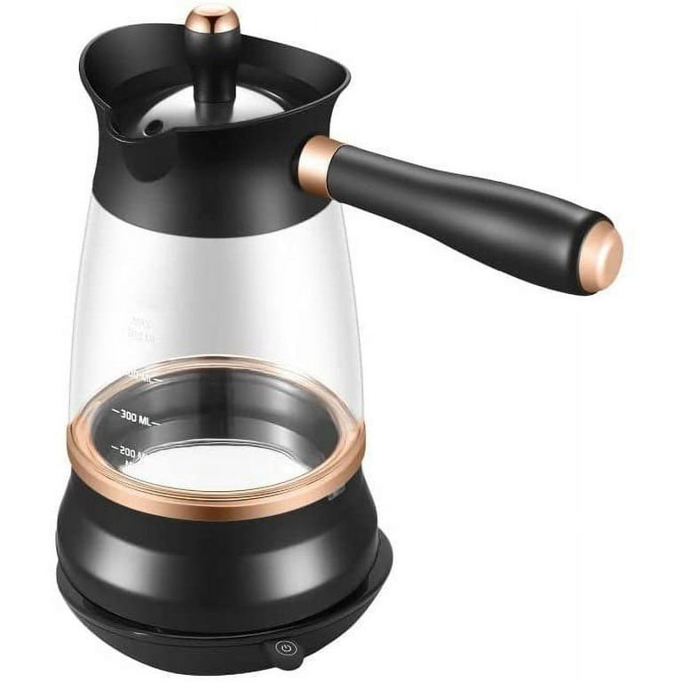 Premium Photo  Electric coffee maker for making turkish coffee coffee pot  coffee beans laid out in shape of heart