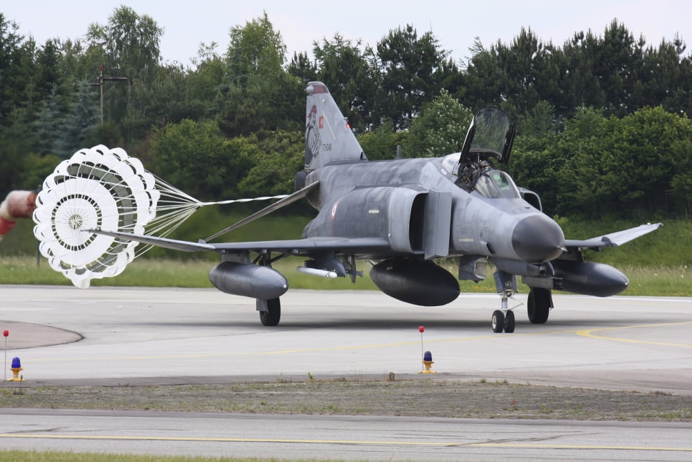Turkish F-4E Phantom with drag parachute deployed Canvas Art - Timm ZiegenthalerStocktrek Images (18 x 12)