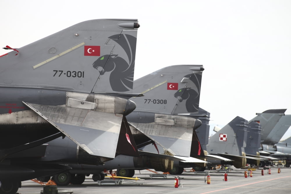 Turkish and Polish aircraft tails Albacete Airfield Spain Canvas Art - Timm ZiegenthalerStocktrek Images (18 x 12)