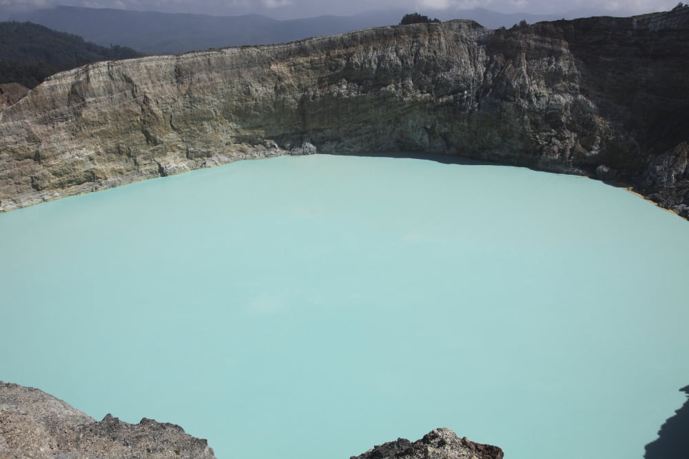 Turquoise crater lake of Kelimutu volcano Flores Island Indonesia Canvas Art - Richard RoscoeStocktrek Images (35 x 23)