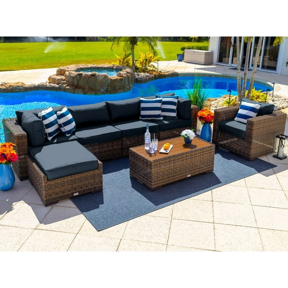 Tuscany 7-Piece Outdoor Patio Furniture Sectional Sofa Set with Four Modular Sectional Pieces, Armchair, Ottoman, and Coffee Table (Half-Round Brown Wicker, Sunbrella Canvas Navy)