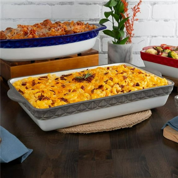 Tuxton EAF-201 6 qt. Porcelain White Embossed Rectangular Casserole - Black Truffle Band