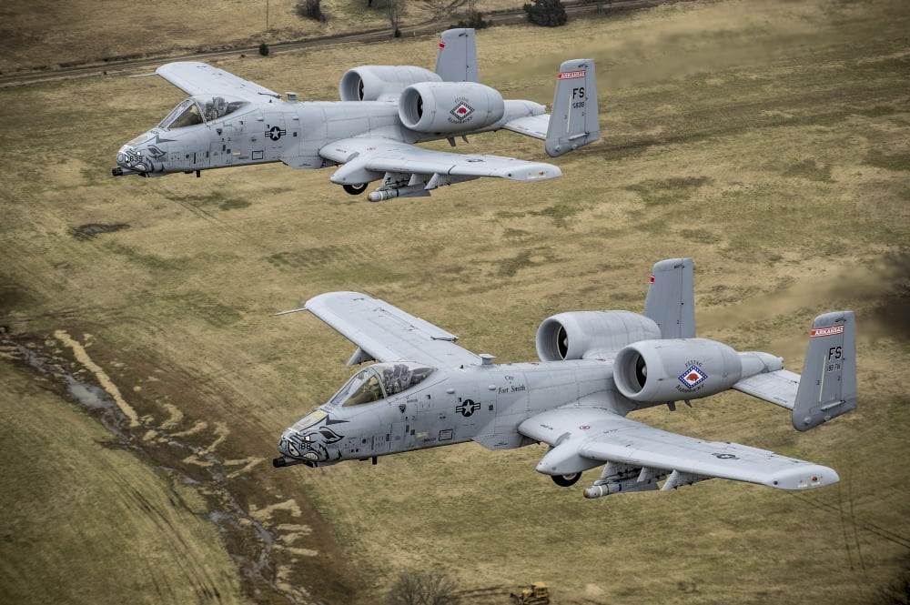 Two A-10 Thunderbolt IIs conduct a training mission over Arkansas Canvas Art - Stocktrek Images (35 x 23)