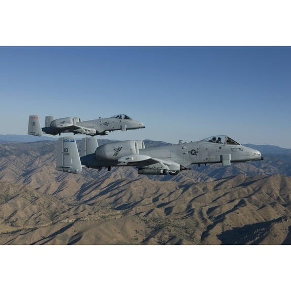 Two A-10 Thunderbolts fly over Central Idaho Poster Print