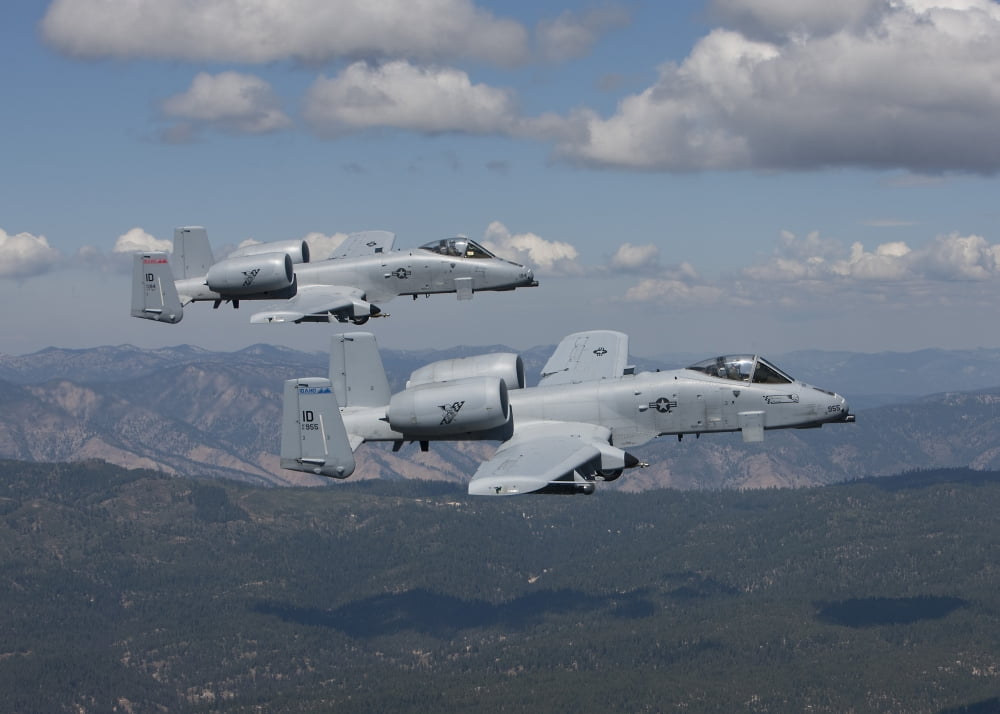 Two A-10 Thunderbolts fly over the mountains in Central Idaho Canvas Art - HIGH-G ProductionsStocktrek Images (17 x 12)