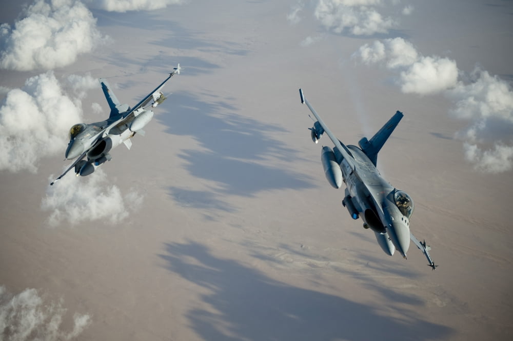 Two Belgian Air Component F-16A Falcons perform a split break Canvas Art - Stocktrek Images (35 x 23)