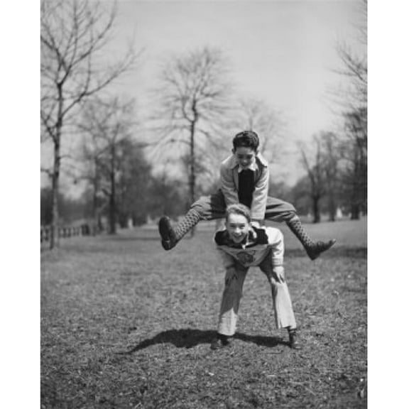 Two Boys Leapfrogging in Park Poster Print - 18 x 24 in.