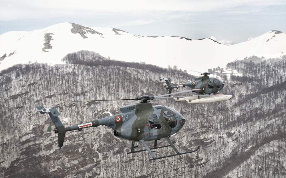 Two Breda Nardi NH-500 helicopters of the Italian Air Force over Frosinone Italy Canvas Art - Giovanni CollaStocktrek Images (18 x 11)