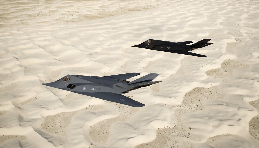 Two F-117 Nighthawk stealth fighters fly over White Sands National Monument Canvas Art - HIGH-G ProductionsStocktrek Images (19 x 11)