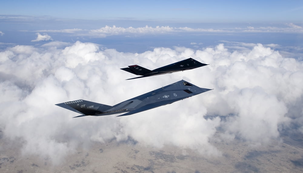 Two F-117 Nighthawk stealth fighters in flight over New Mexico Canvas Art - HIGH-G ProductionsStocktrek Images (19 x 11)