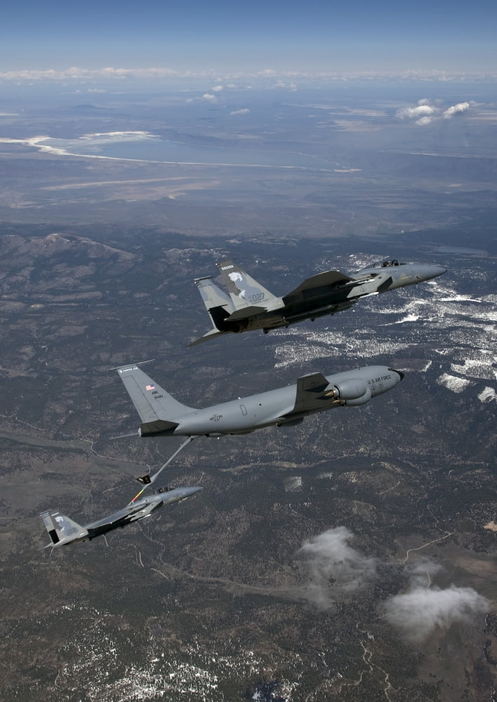 Two F-15 Eagles conduct aerial refueling with a KC-135 Stratotanker Canvas Art - HIGH-G ProductionsStocktrek Images (24 x 34)