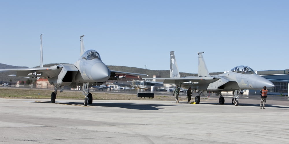 Two F-15 Eagles undergo preflight checks prior to takeoff Canvas Art - HIGH-G ProductionsStocktrek Images (21 x 10)