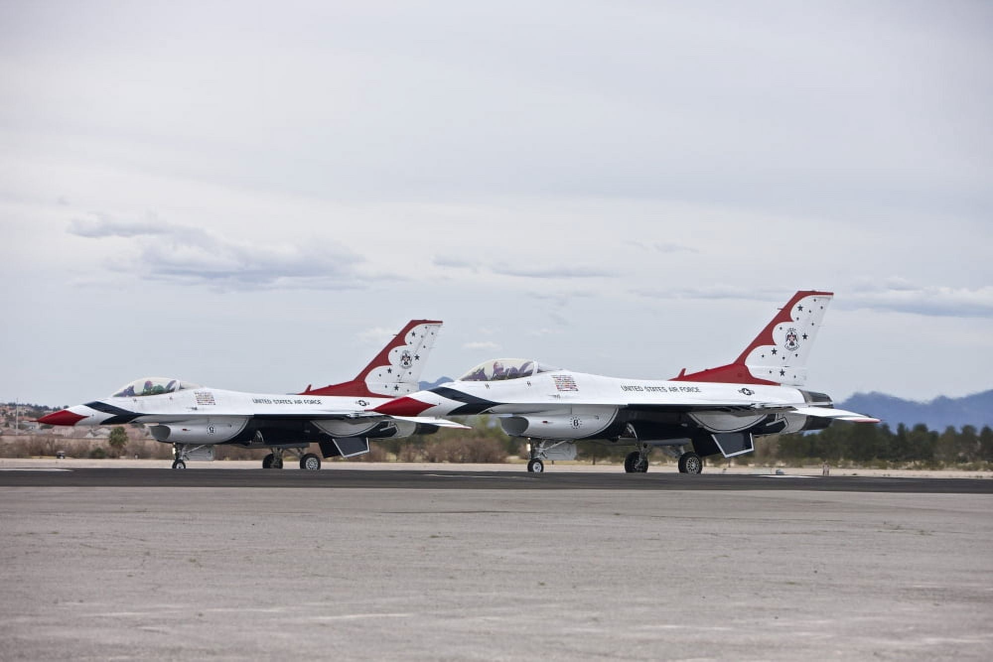 Two F-16C Thunderbirds sit on the runway at Nellis Air Force Base Nevada Canvas Art - Terry MooreStocktrek Images (35 x 23)