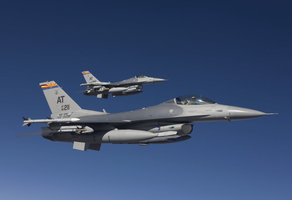 Two F-16s fly in formation over Arizona Canvas Art - HIGH-G ProductionsStocktrek Images (35 x 24)