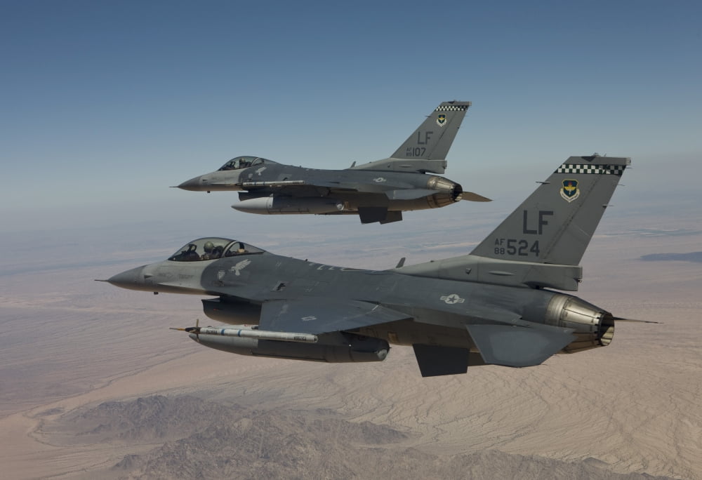 Two F-16s fly in formation over Arizona Canvas Art - HIGH-G ProductionsStocktrek Images (35 x 24)