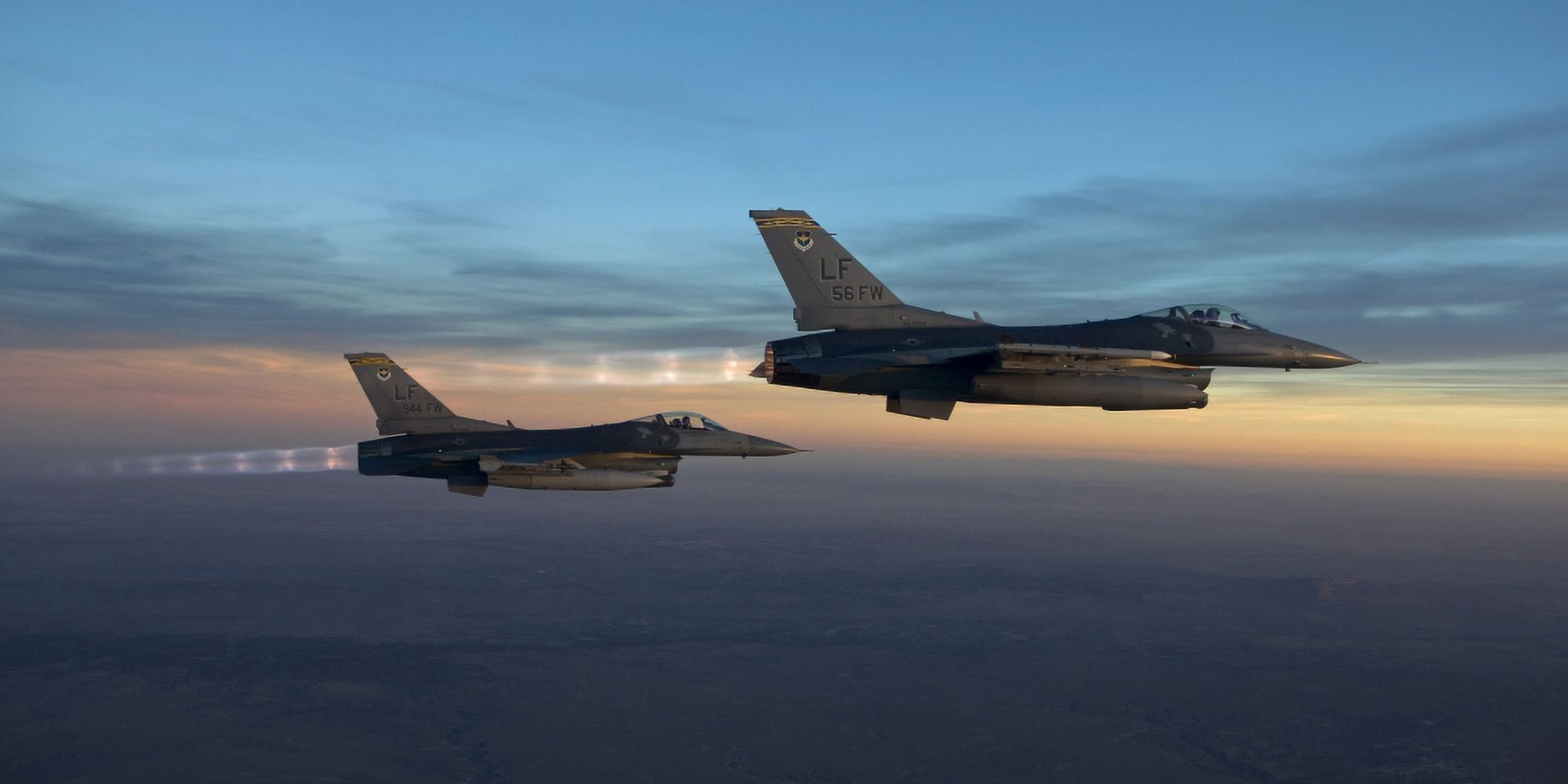 Two F-16s fly in formation over Arizona before sunset Canvas Art - HIGH-G ProductionsStocktrek Images (20 x 10)