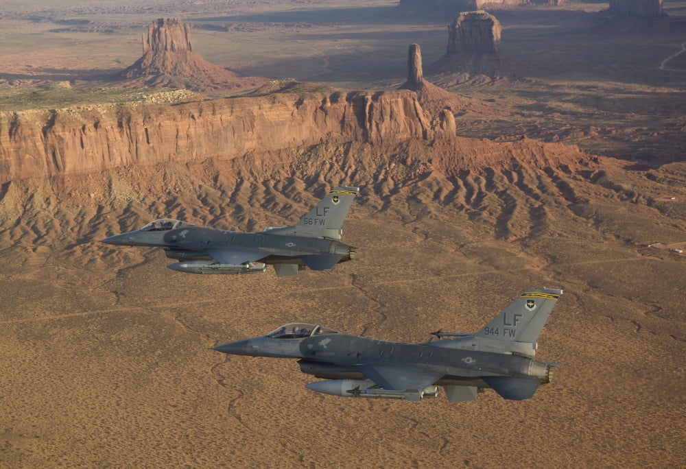 Two F-16s fly in formation over Northern Arizona Canvas Art - HIGH-G ProductionsStocktrek Images (35 x 24)