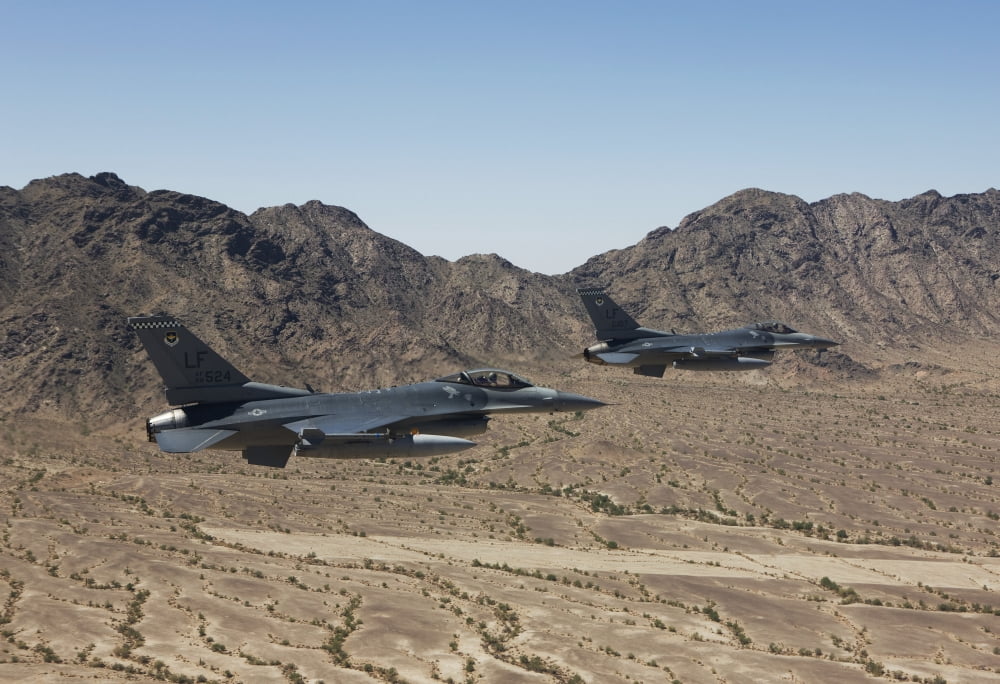 Two F-16s fly in formation over the Arizona desert Canvas Art - HIGH-G ProductionsStocktrek Images (35 x 24)