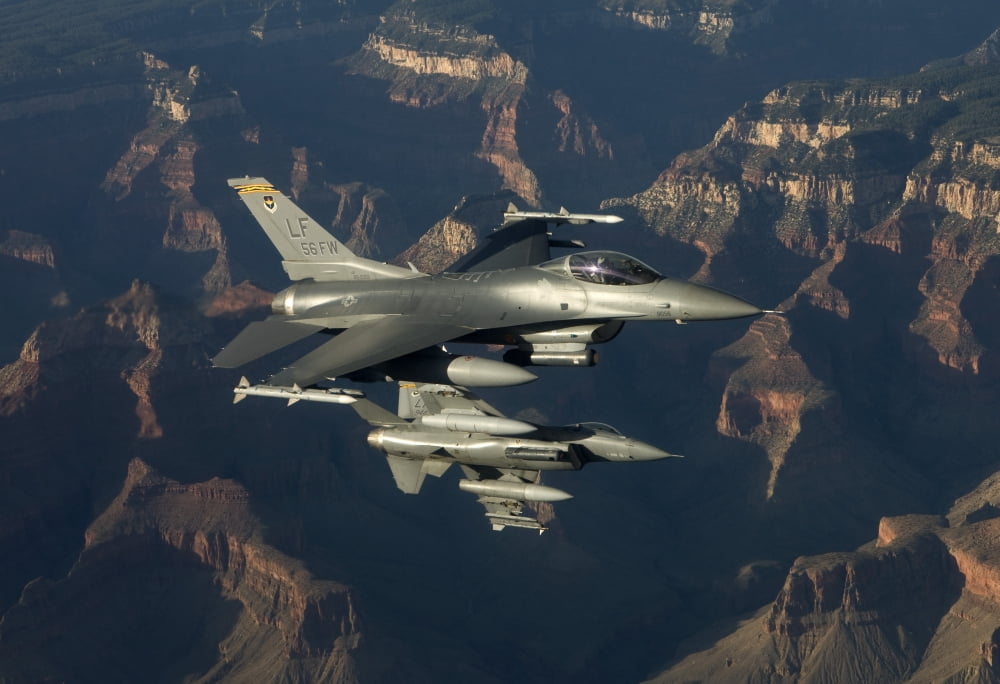 Two F-16s fly in formation over the Grand Canyon Arizona Canvas Art - HIGH-G ProductionsStocktrek Images (35 x 24)