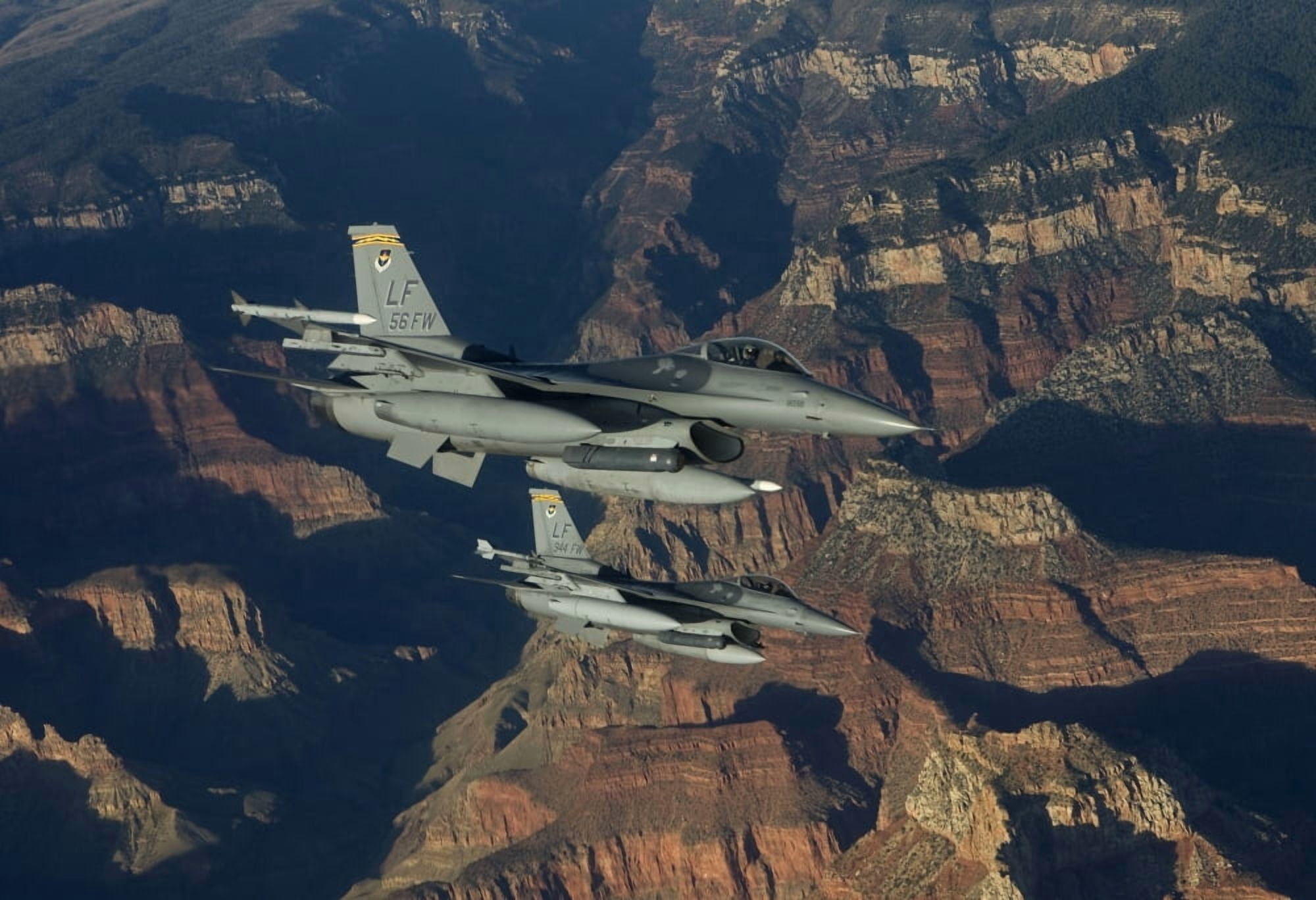 Two F-16s fly in formation over the Grand Canyon Arizona Canvas Art - HIGH-G ProductionsStocktrek Images (35 x 24)
