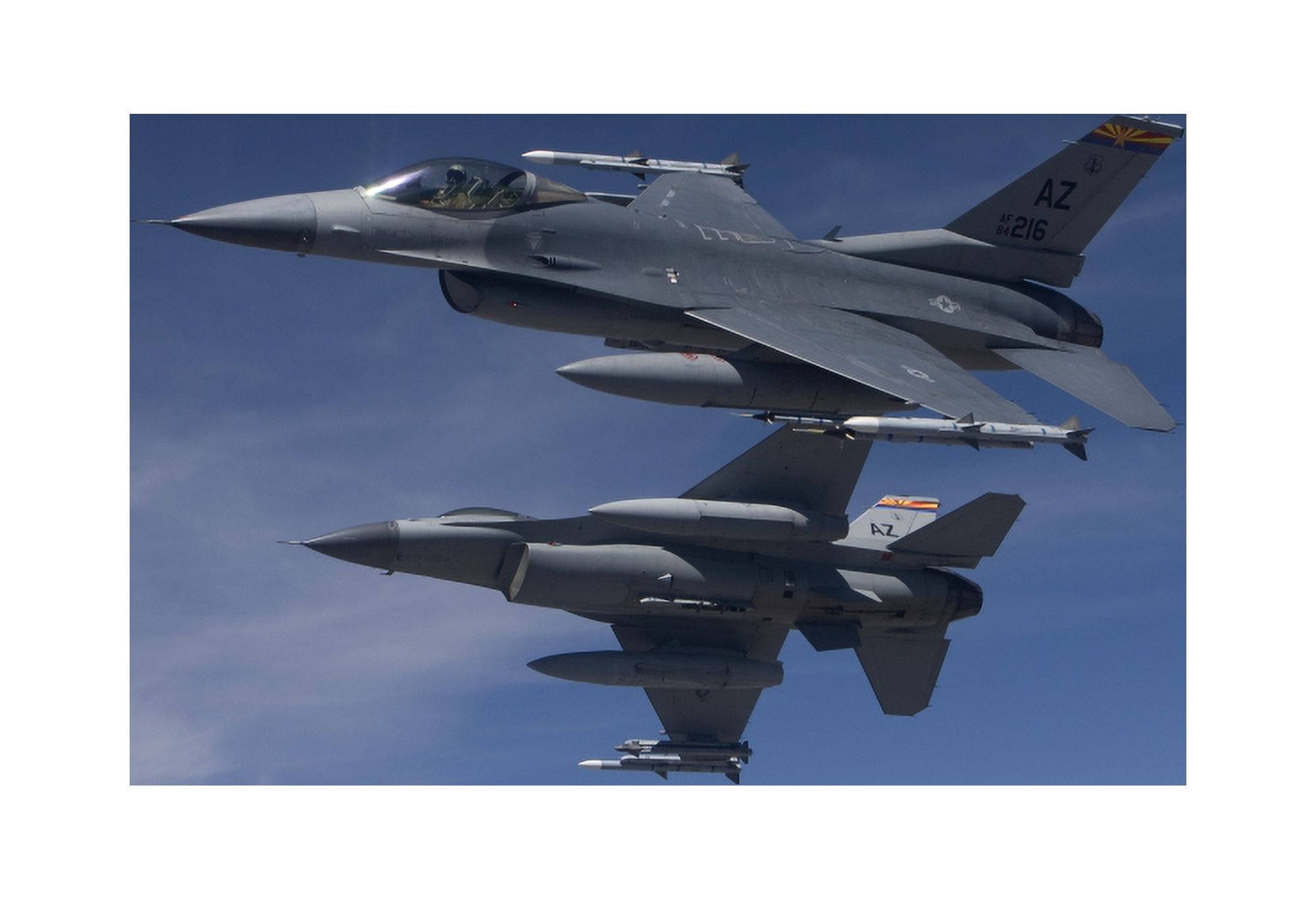 Two F-16s manuever on an air-to-air training mission Canvas Art - HIGH-G ProductionsStocktrek Images (18 x 12)