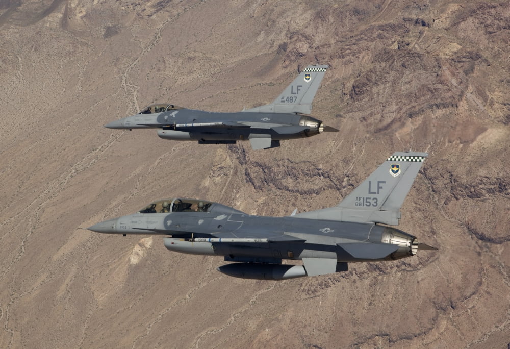 Two F-16s on a training mission over the Arizona desert Canvas Art - HIGH-G ProductionsStocktrek Images (35 x 24)