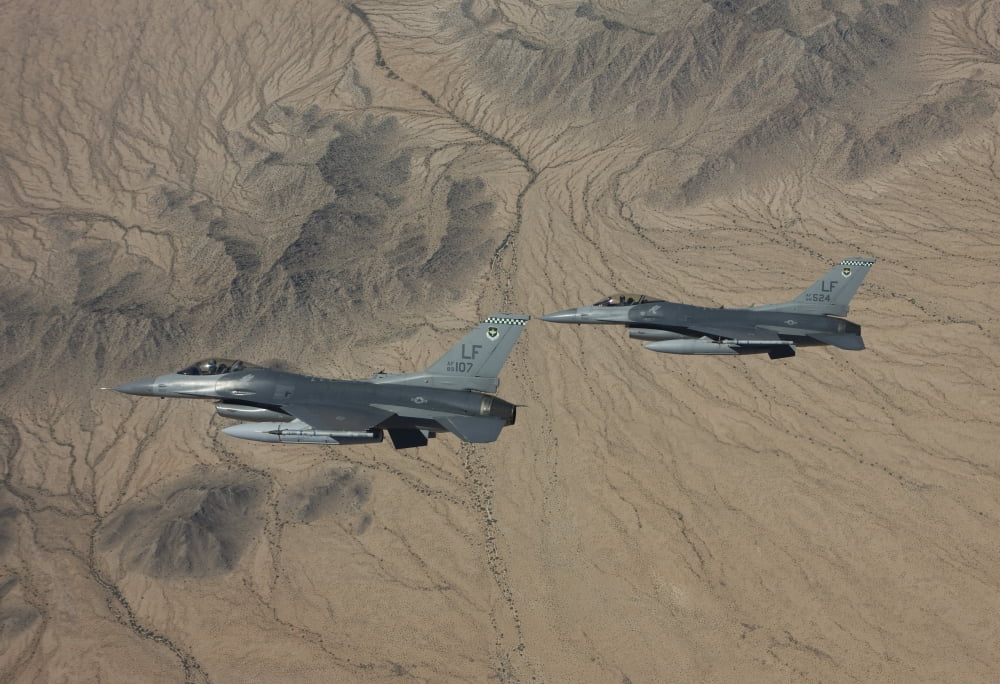 Two F-16s on a training mission over the Arizona desert Canvas Art - HIGH-G ProductionsStocktrek Images (35 x 24)