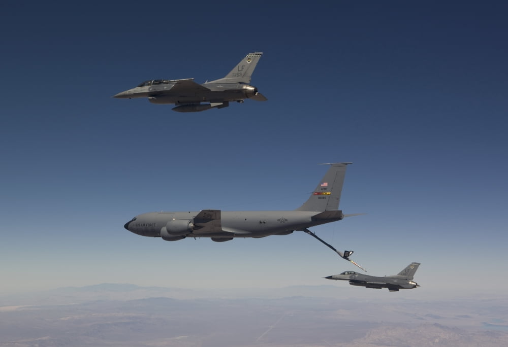 Two F-16s prepare to refuel from a KC-135 Stratotanker Canvas Art - HIGH-G ProductionsStocktrek Images (35 x 24)