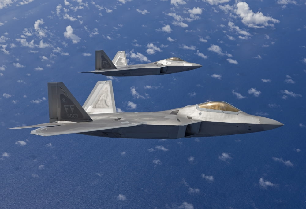 Two F-22 Raptors fly in formaton during a training mission Canvas Art - HIGH-G ProductionsStocktrek Images (35 x 24)