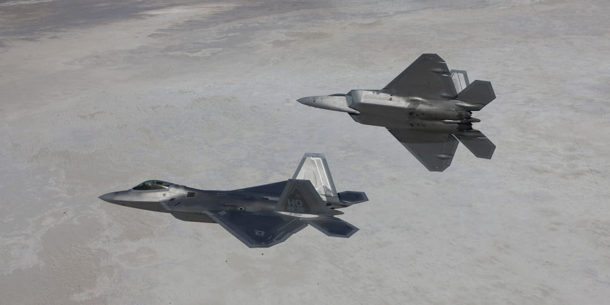 Two F-22 Raptors on a training mission over New Mexico Canvas Art - HIGH-G ProductionsStocktrek Images (20 x 10)
