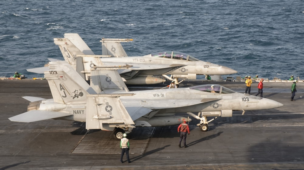 Two FA-18 Super Hornet aircraft on the flight deck of USS George HW Bush Canvas Art - Giovanni CollaStocktrek Images (19 x 11)