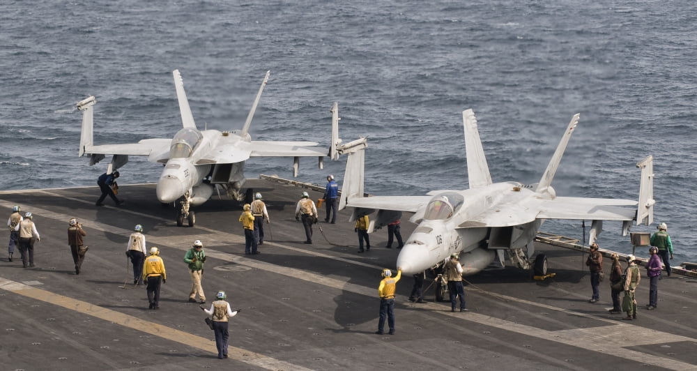 Two FA-18 Super Hornet aircraft on the flight deck of USS George HW Bush Canvas Art - Giovanni CollaStocktrek Images (38 x 21)