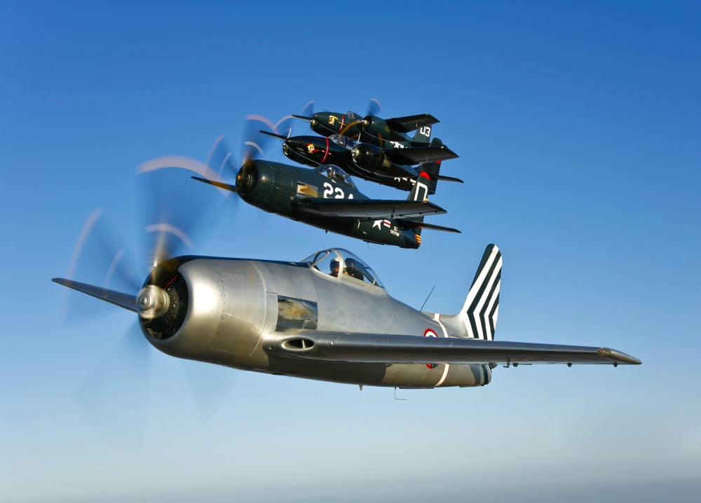 Two Grumman F8F Bearcats and two F7F Tigercats fly in formation Canvas Art - Scott GermainStocktrek Images (33 x 24)