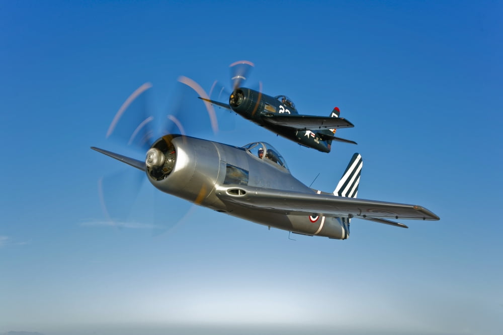 Two Grumman F8F Bearcats in flight Canvas Art - Scott GermainStocktrek Images (18 x 12)