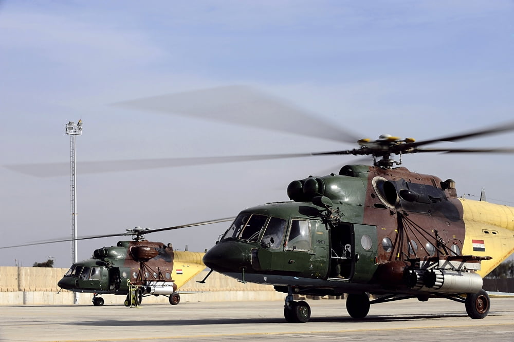 Two Iraqi Mi-17 Hip Helicopters conduct an aeromedical evacuation mission Canvas Art - Stocktrek Images (34 x 23)