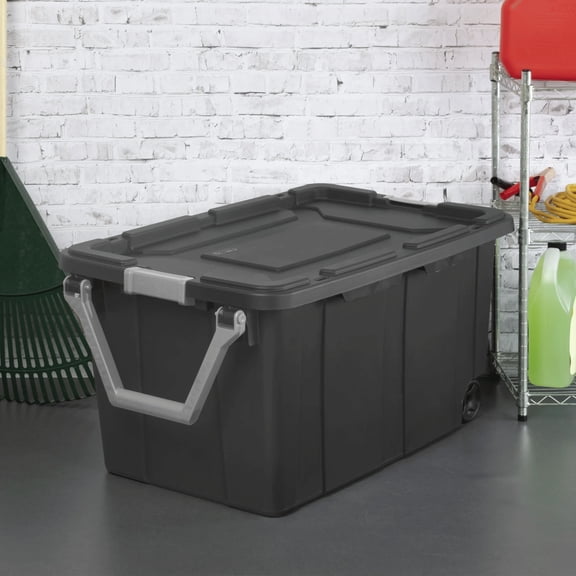 Two Large Black Storage Boxes with Movable Wheel Covers and Handles, Lightweight and Durable, Suitable for Warehouses and Tool Rooms.