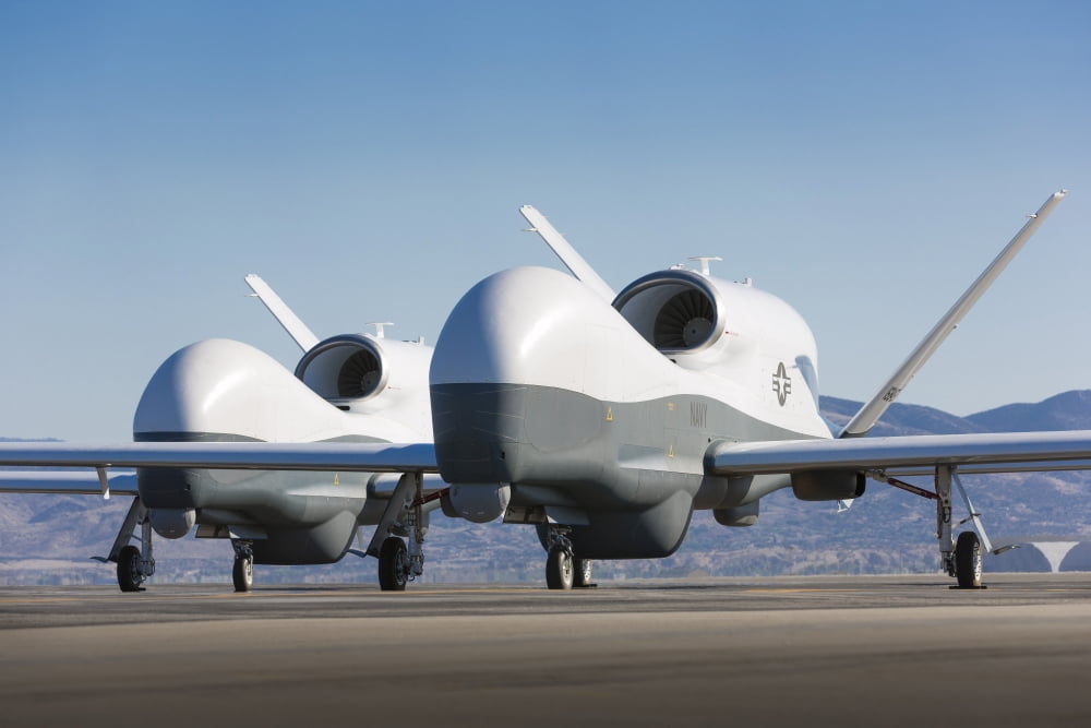 Two MQ-4C Triton unmanned aerial vehicles on the tarmac Canvas Art - Stocktrek Images (35 x 23)