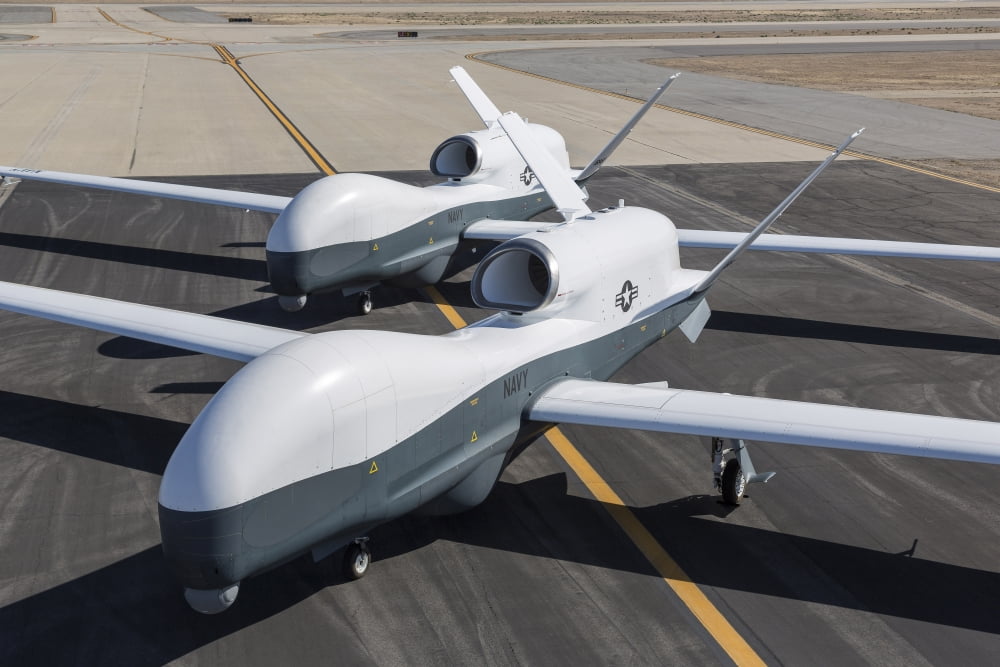 Two MQ-4C Triton unmanned aerial vehicles on the tarmac Canvas Art - Stocktrek Images (35 x 23)