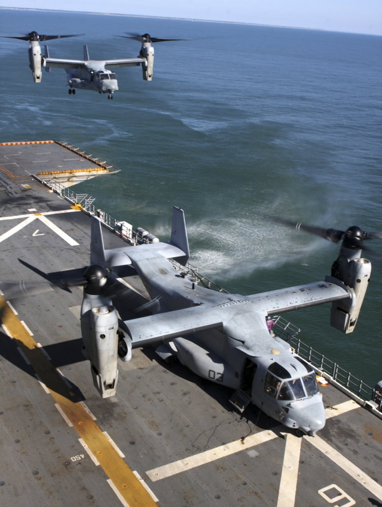 Two MV-22 Ospreys land on the flight deck of USS Nassau Canvas Art - Stocktrek Images (25 x 33)