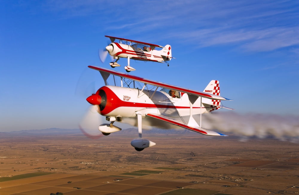 Two Pitts Model 12 aircraft in flight Canvas Art - Scott GermainStocktrek Images (18 x 12)