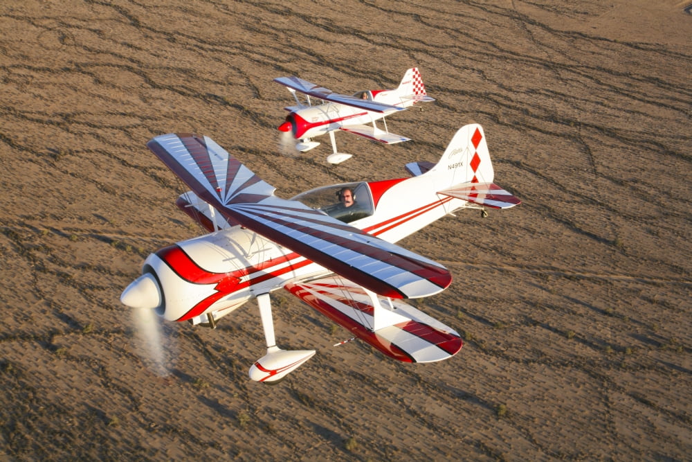 Two Pitts Model 12 aircraft in flight Canvas Art - Scott GermainStocktrek Images (18 x 12)