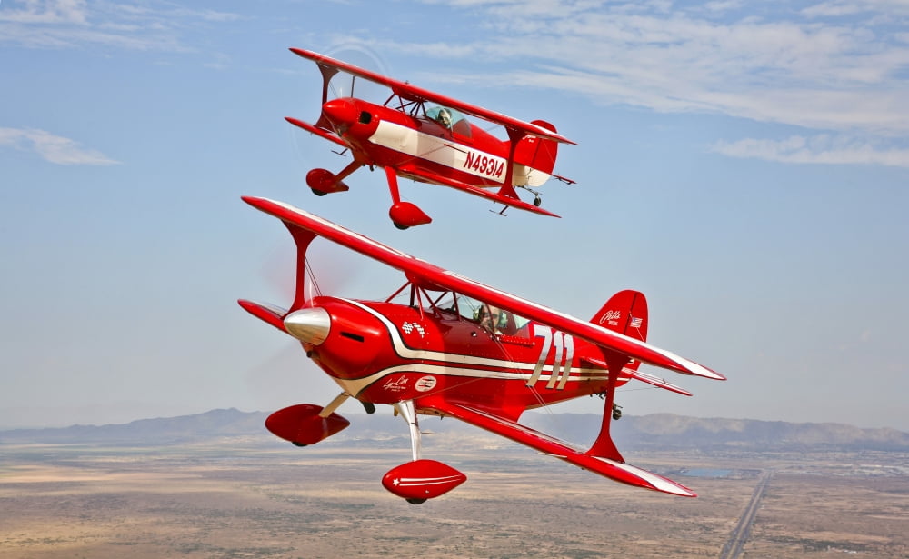Two Pitts Special S-2A aerobatic biplanes in flight near Chandler Arizona Canvas Art - Scott GermainStocktrek Images (18 x 11)