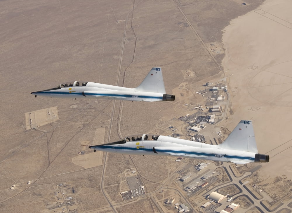 Two T-38A mission support aircraft fly in tight formation Canvas Art - Stocktrek Images (33 x 24)