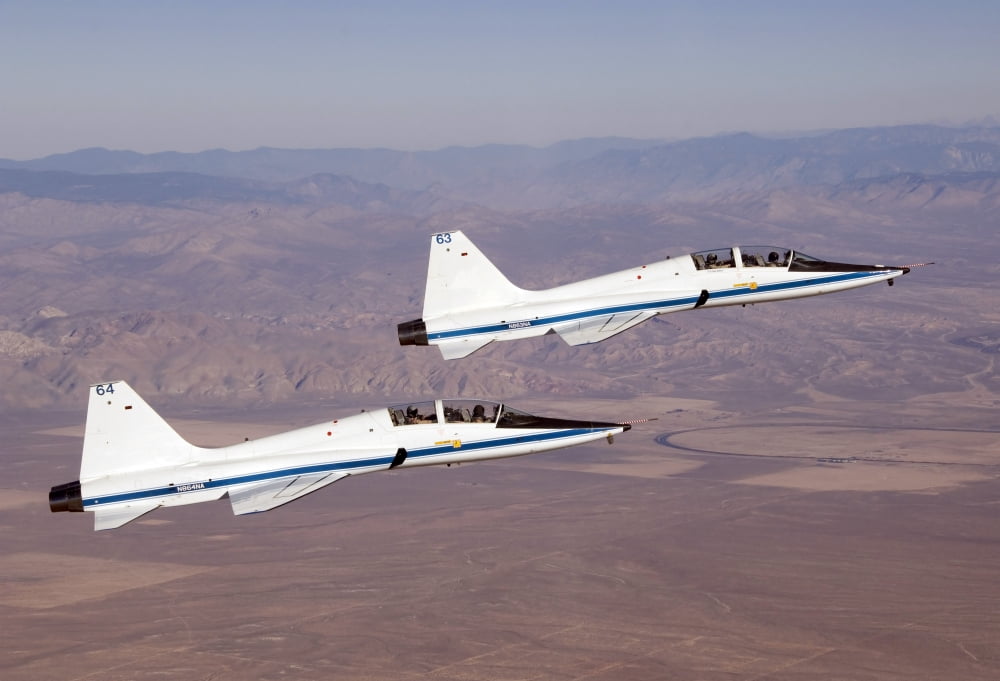 Two T-38A mission support aircraft fly in tight formation Canvas Art - Stocktrek Images (34 x 24)